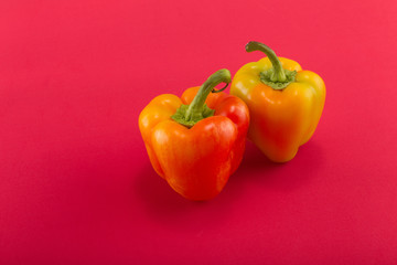 Sweet bellpepper on a colored background. Studio light. Top view
