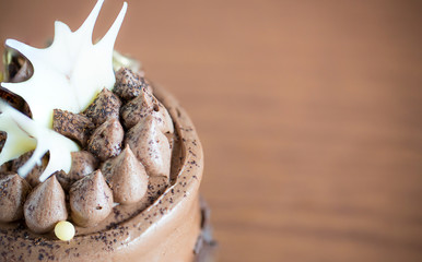 Close up part of Birthday Mini cake in front of a chalkboard.mini cake.chocolate cake for love valentines.