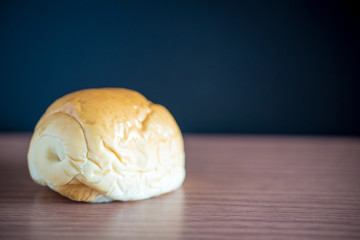 bread Isolated on a wooden table and blackboard on background. High energy and nutrient for breakfast. Original gourmet from westerner.