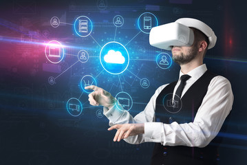 Businessman in vr glasses organize lifesize projected social media concept
