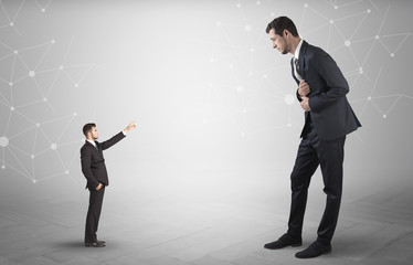 Small businessman aiming at a big businessman with connection and network concept
