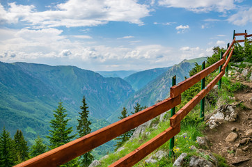 A stony path goes through the top of the mountain.