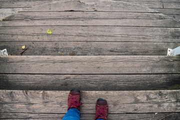 Red shoes in a wooden stair