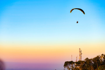 Paragliding at sunset