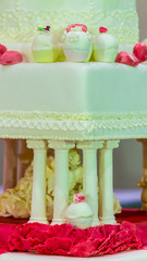 Sweet topping wedding cake decoration./ Sweet beauty flower and topping pastel color on homemade wedding cake decoration.