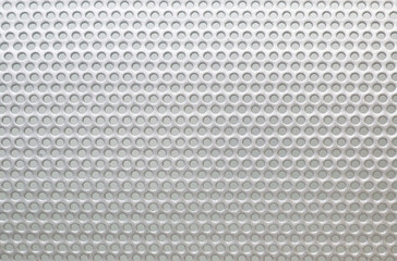 Metal grille with holes. Macro background