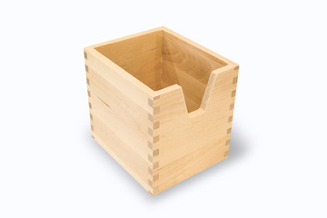 A soft wooden box rests on a white background with clipping path