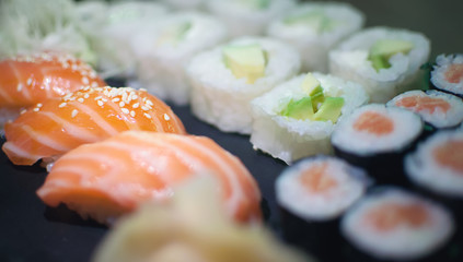 Salmon sushi and avocado roll in rice paper