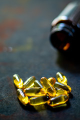Fish oil on black background 