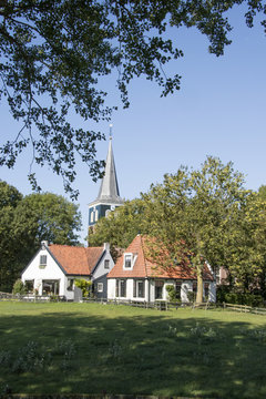 Picturesque rural image of a church and houses
