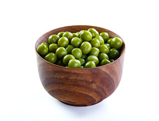 Green peas in wooden  bowl 