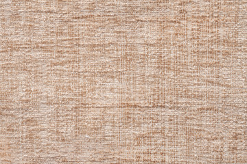 Fototapeta na wymiar Light beige background of soft, fleecy cloth. Texture of textile closeup