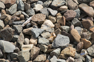 Historically wooden rail ties and stone blocks