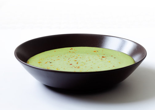 Split Pea Soup In An Old Bowl On A White Background