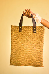 Handbags made of papyrus Water weed grows well in wetlands of tropical Southeast Asia. Rural women...