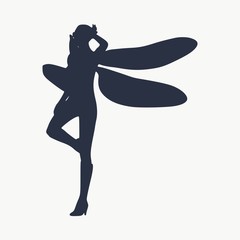 Young woman silhouette with wings of dragonfly