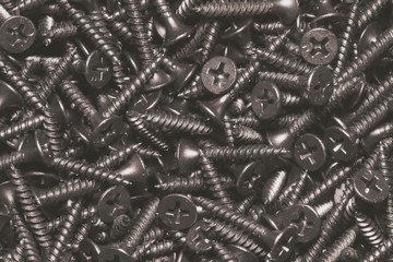 Black self-tapping screw. Screws for construction work.