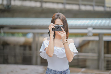 Fototapeta premium Young asian woman traveling to landmark in Bangkok Thailand.