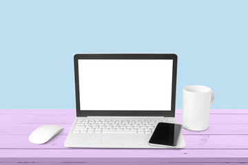 Laptop and mobile on the table