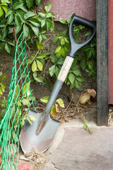 small shovel against the wall