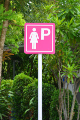 pink ladies parking sign mark on nature background