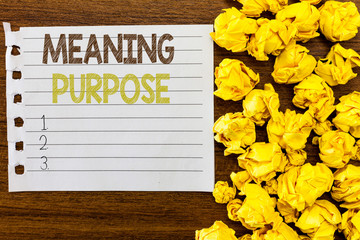 Handwriting text Meaning Purpose. Concept meaning The reason for which something is done or created...
