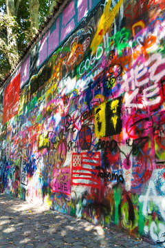 Famous John Lennon Wall covered with graffiti in the Little Town area near Charles Bridge, Mala Strana, Prague, Czech Republic