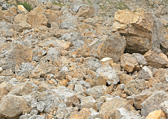 stones and solid rock of a landslip