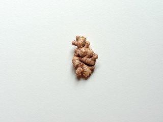 Isolated ginger root over a white background in studio.