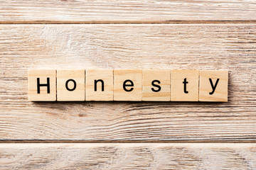 honesty word written on wood block. honesty text on table, concept