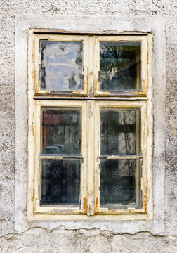 Old window with peeling paint