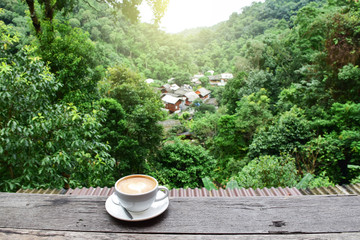 morning coffee on the wooden balcony in the hidden village of Mae Kampong, Chiang Mai, full of nature and refreshment