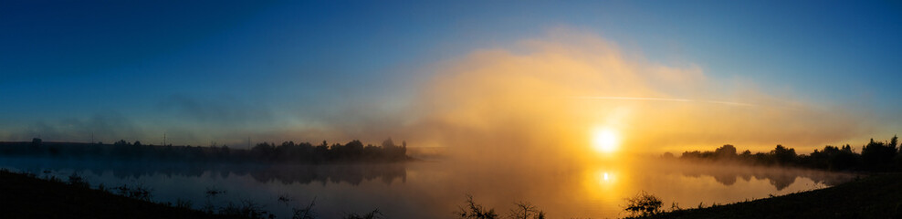 Sunrise over the river. Fantastic colors. panorama.