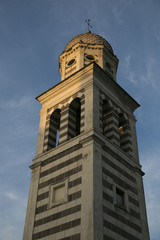 Detail of Sant'Andrea church bell tower in Levanto. Liguria, Italy.