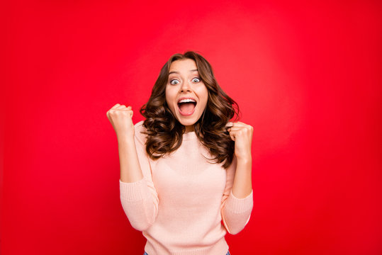 Close up portrait of stylish modern wave hairstyle raised fists 