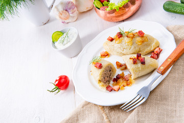 Rustic Cepelinai, a specialty Lithuanian and Polish cuisine.