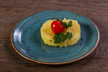 Mashed potato served tomato
