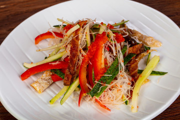 Asian salad with salmon skin