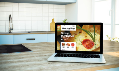 mockup of cooking blog screen laptop on island at kitchen
