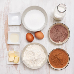ingredients for make cake on white background
