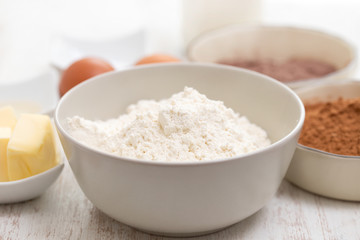 ingredients for make cake on white background