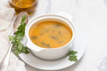 pumpkin soup in white bowl