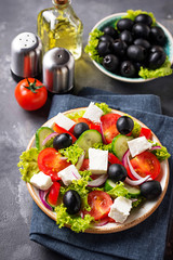 Traditional Greek salad with feta, olives and vegetables