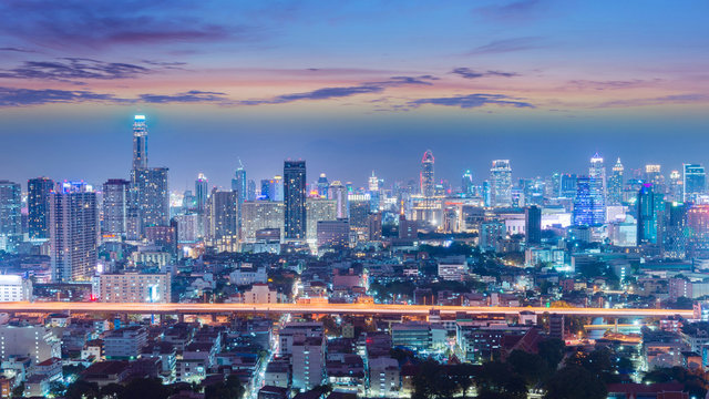 Bangkok business and travel landmark famous district urban skyline aerial view at night.
