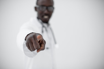 background image. attractive doctor pointing at you.