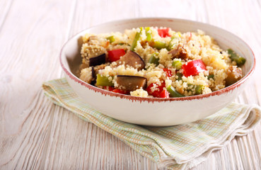 Couscous with vegetables in a bowl