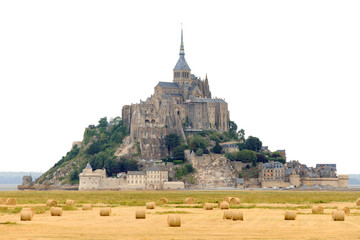 Beautiful view of historic landmark Le Mont Saint-Michel in Normandy, France, a famous UNESCO world heritage site and tourist attraction, in summer isolated on a white background