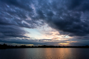 colorful dramatic sky with cloud at sunset.