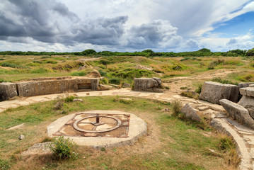 Beautiful view of the remains of German bunkers at the Pointe du Hoc in the dunes of Normandy,...