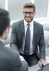 close up. businessman shaking hands with business partner